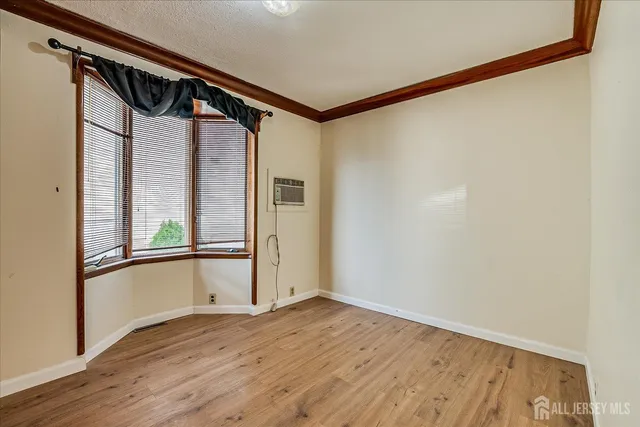 a view of a hardwood & an entryway