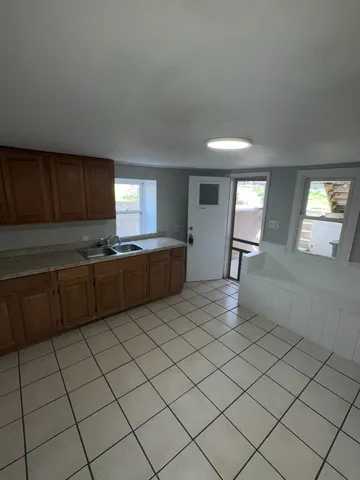 a kitchen with granite countertop granite top and stainless steel appliances