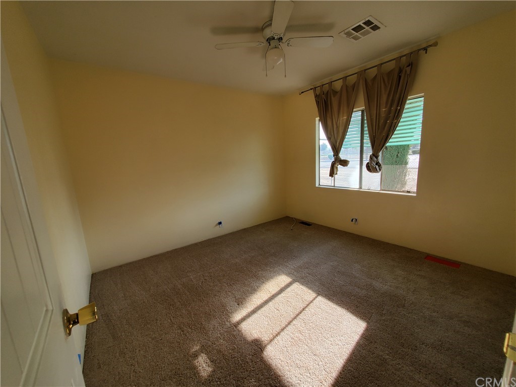 1685 Murrieta Road Perris, CA 92571 - Photo 14 of 19 an empty room with windows