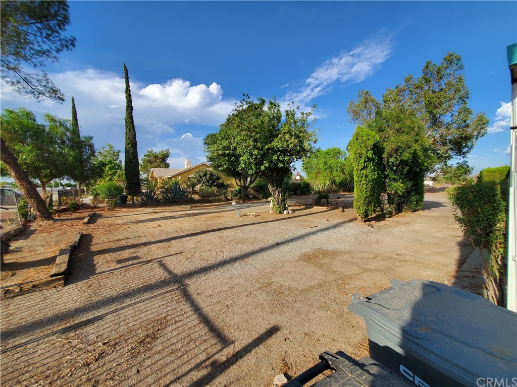 1685 Murrieta Road Perris, CA 92571 - Photo 16 of 19 a view of a street with houses