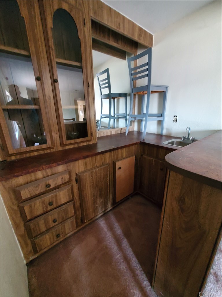 1685 Murrieta Road Perris, CA 92571 - Photo 6 of 19 a kitchen with stainless steel appliances granite countertop a sink stove and cabinets