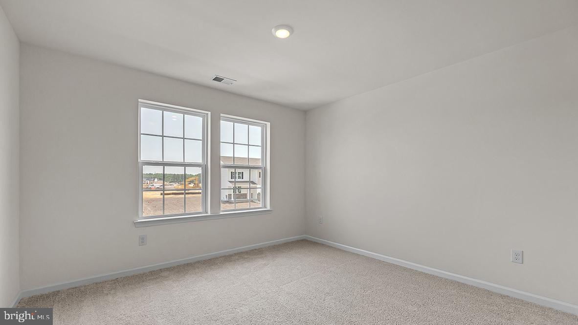 155 Littleworth Road Manahawkin, NJ 08050 - Photo 27 of 32 an empty room with a window