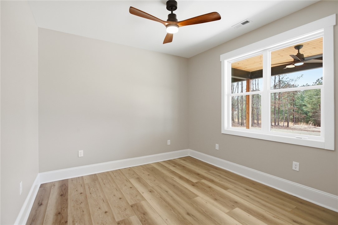 147 McAlister Road West Union, SC 29696 - Photo 23 of 49 This bright room features a large window, offering abundant natural light and serene outdoor views.