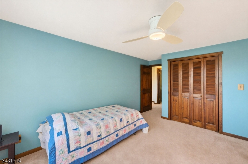 1530 Mountain Top Road Bridgewater, NJ 08807 - Photo 33 of 50 a bedroom with a bed and a window