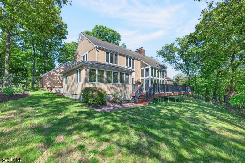 1530 Mountain Top Road Bridgewater, NJ 08807 - Photo 39 of 50 a view of a house with a yard and sitting area