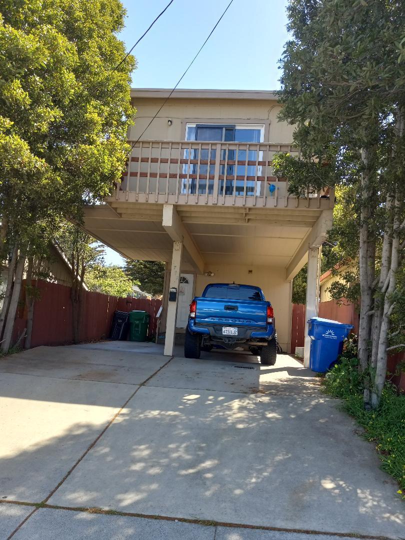 1702 Goodwin Street Seaside, CA 93955 - Photo 1 of 6 a car parked in front of a house