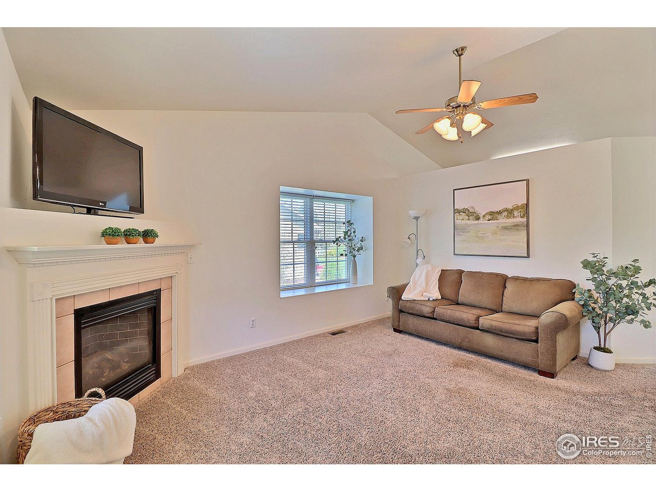1355 Black Hawk Road Eaton, CO 80615 - Photo 5 of 40 Living room that's bright and light!