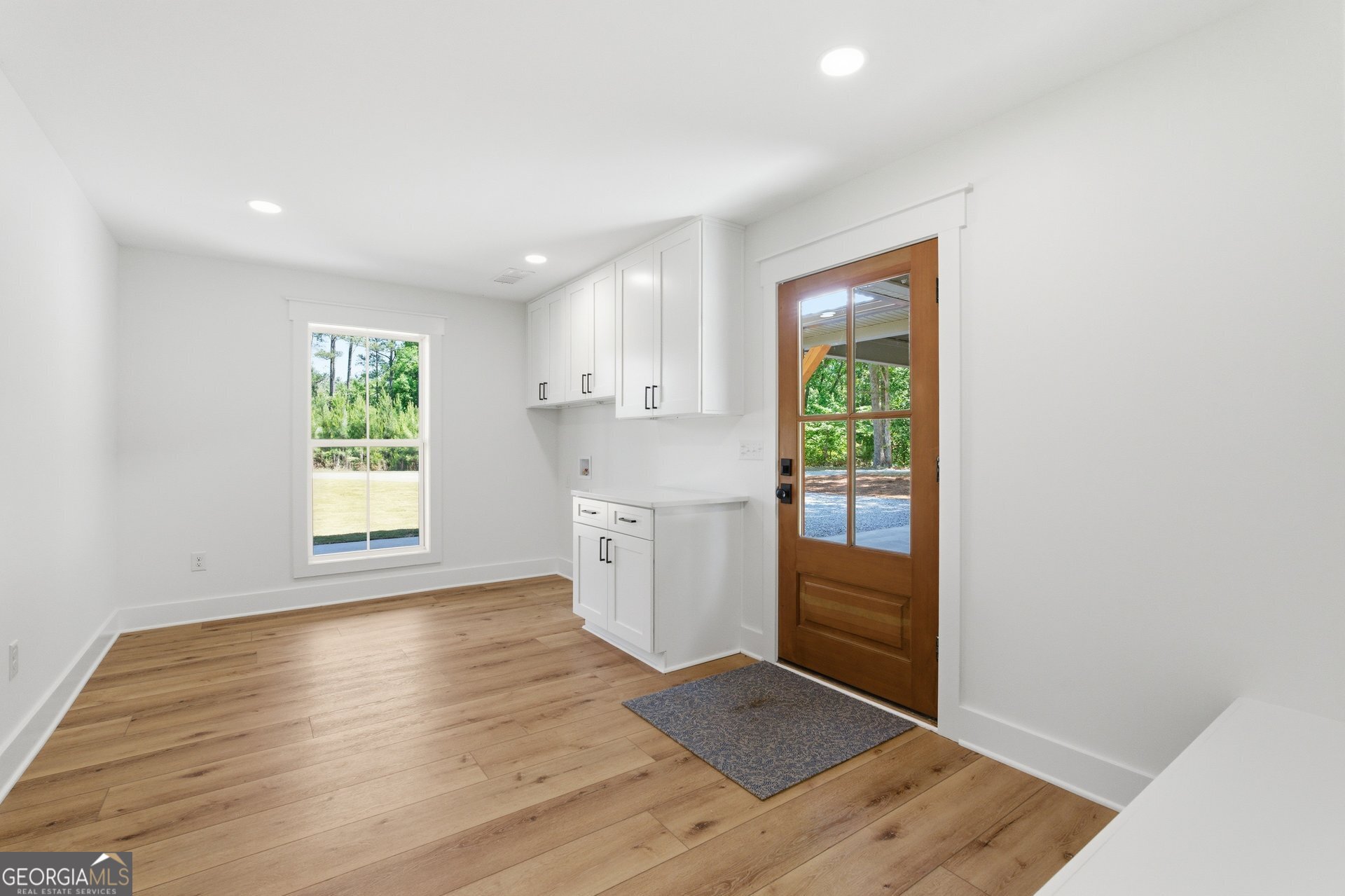 5938 Ridgeway Road Franklin, GA 30217 - Photo 16 of 41 a kitchen with a wooden floor and window