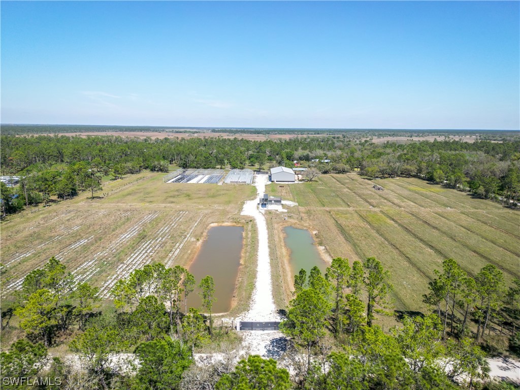 1422 Gate Road LaBelle, FL 33935 - Photo 13 of 16 an aerial view of a houses with outdoor space