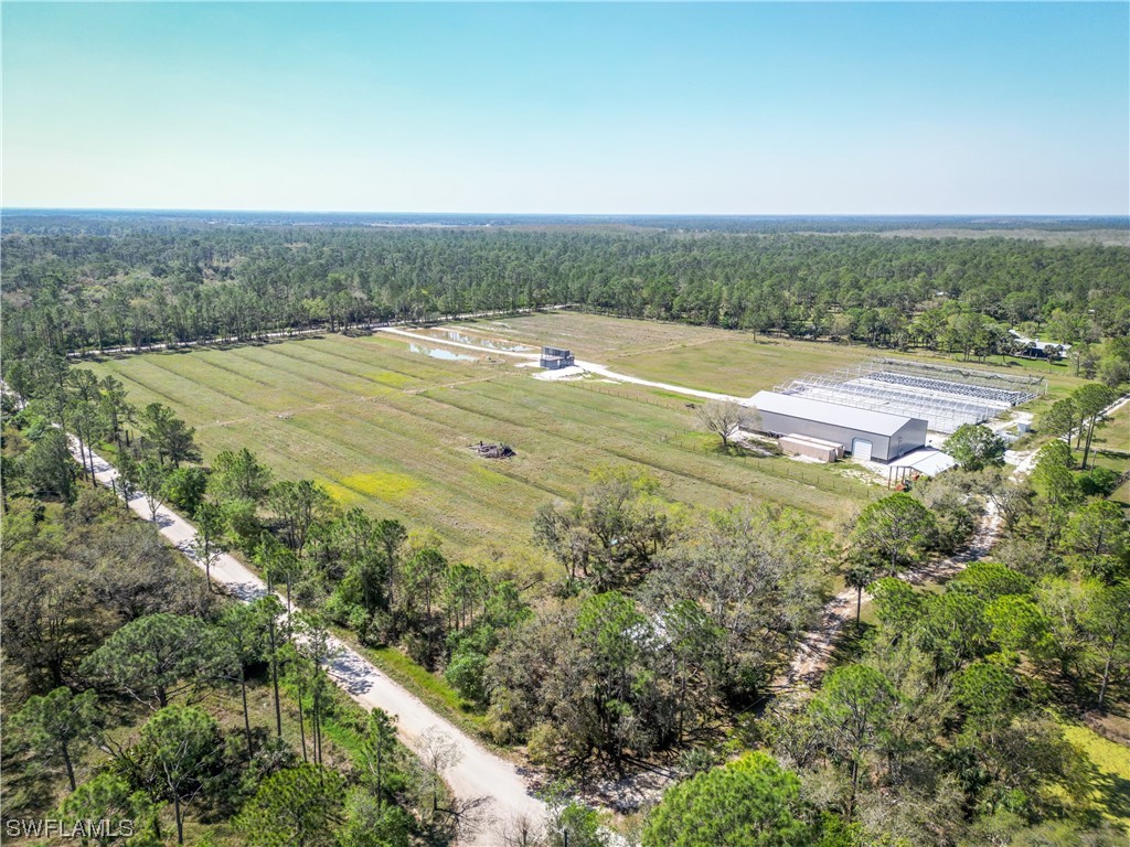 1422 Gate Road LaBelle, FL 33935 - Photo 15 of 16 a view of a field with an ocean