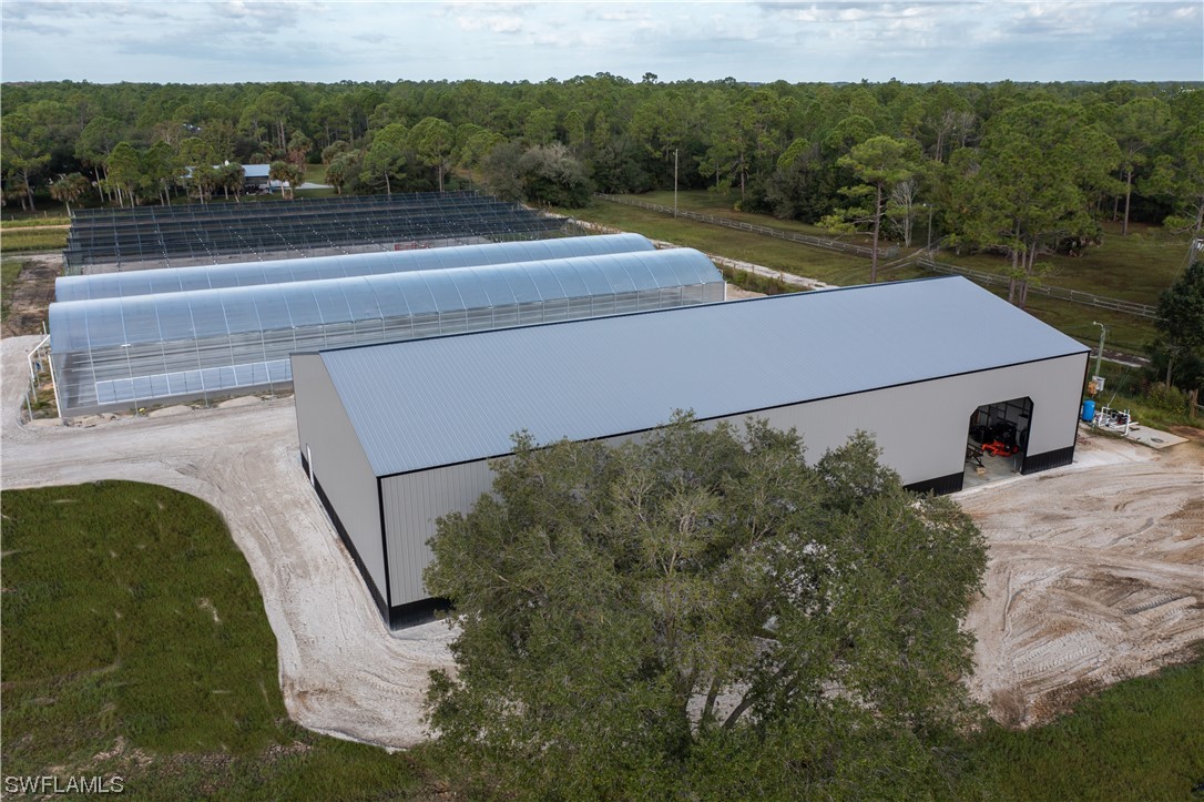 1422 Gate Road LaBelle, FL 33935 - Photo 4 of 16 an aerial view of a house with a yard