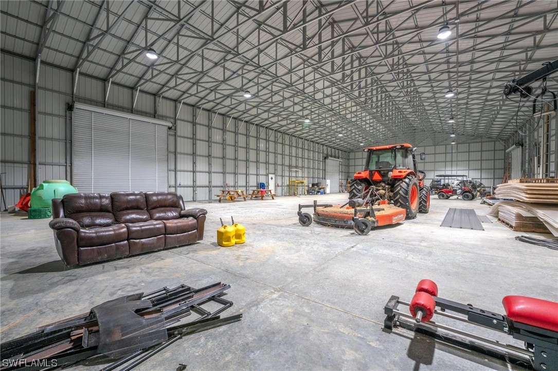 1422 Gate Road LaBelle, FL 33935 - Photo 7 of 16 a view of a children toys back of the house