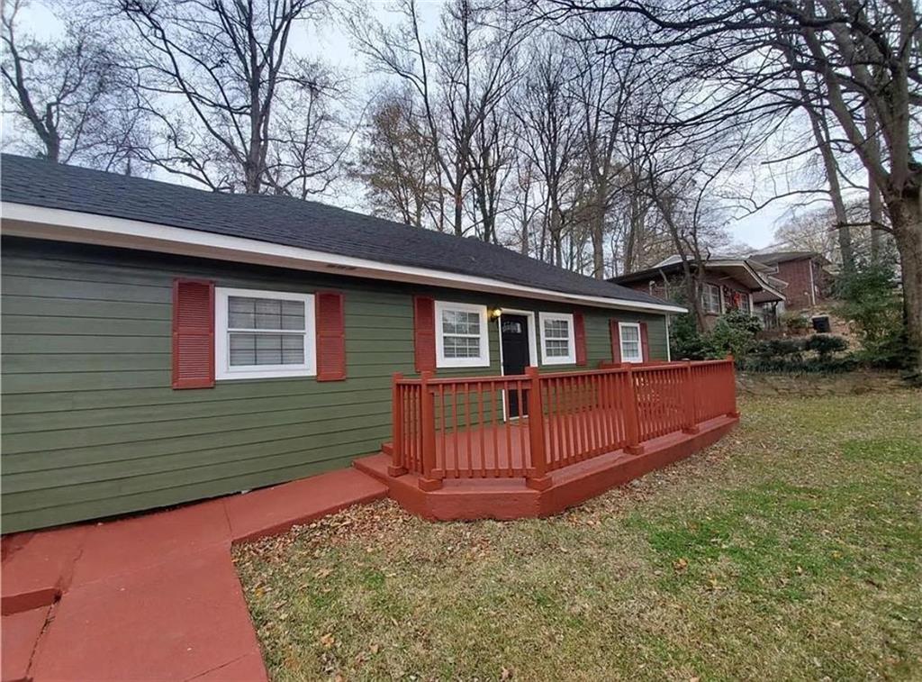 411 Dorsey Road Atlanta, GA 30354 - Photo 17 of 19 a view of a house with a yard