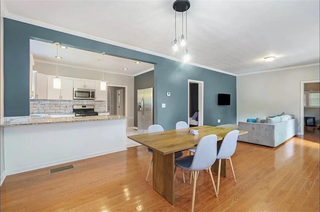 411 Dorsey Road Atlanta, GA 30354 - Photo 6 of 19 a view of a dining room with furniture