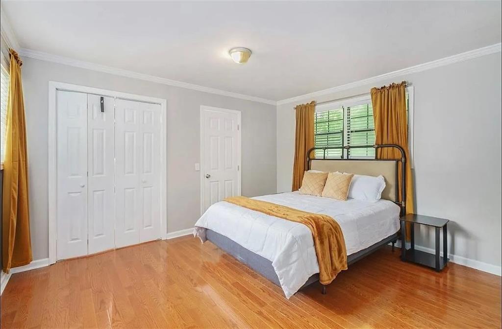 411 Dorsey Road Atlanta, GA 30354 - Photo 9 of 19 a bedroom with a bed and a window