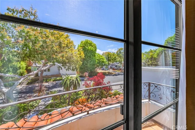 a view of a balcony with staircase