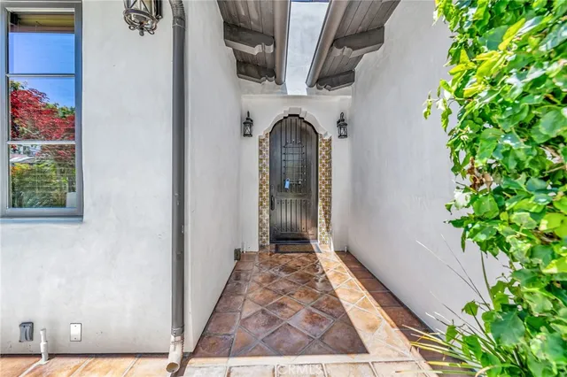 a view of a hallway with seating area