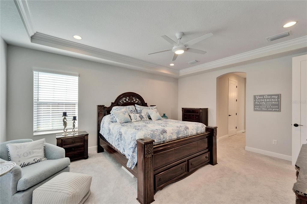 9152 Warm Spgs Circle Parrish, FL 34219 - Photo 19 of 38 a bedroom with a bed couch and window
