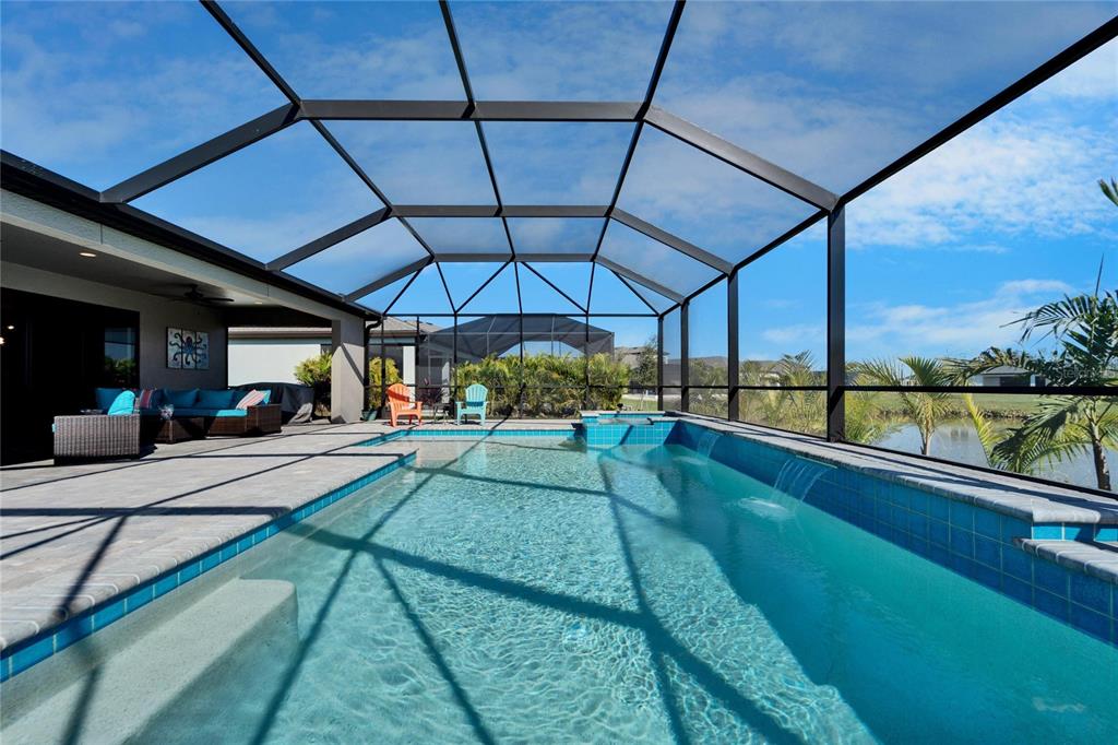 9152 Warm Spgs Circle Parrish, FL 34219 - Photo 28 of 38 a view of a backyard with sitting area
