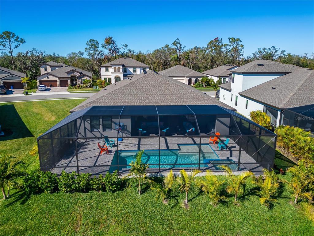 9152 Warm Spgs Circle Parrish, FL 34219 - Photo 31 of 38 an aerial view of a house with swimming pool garden and patio