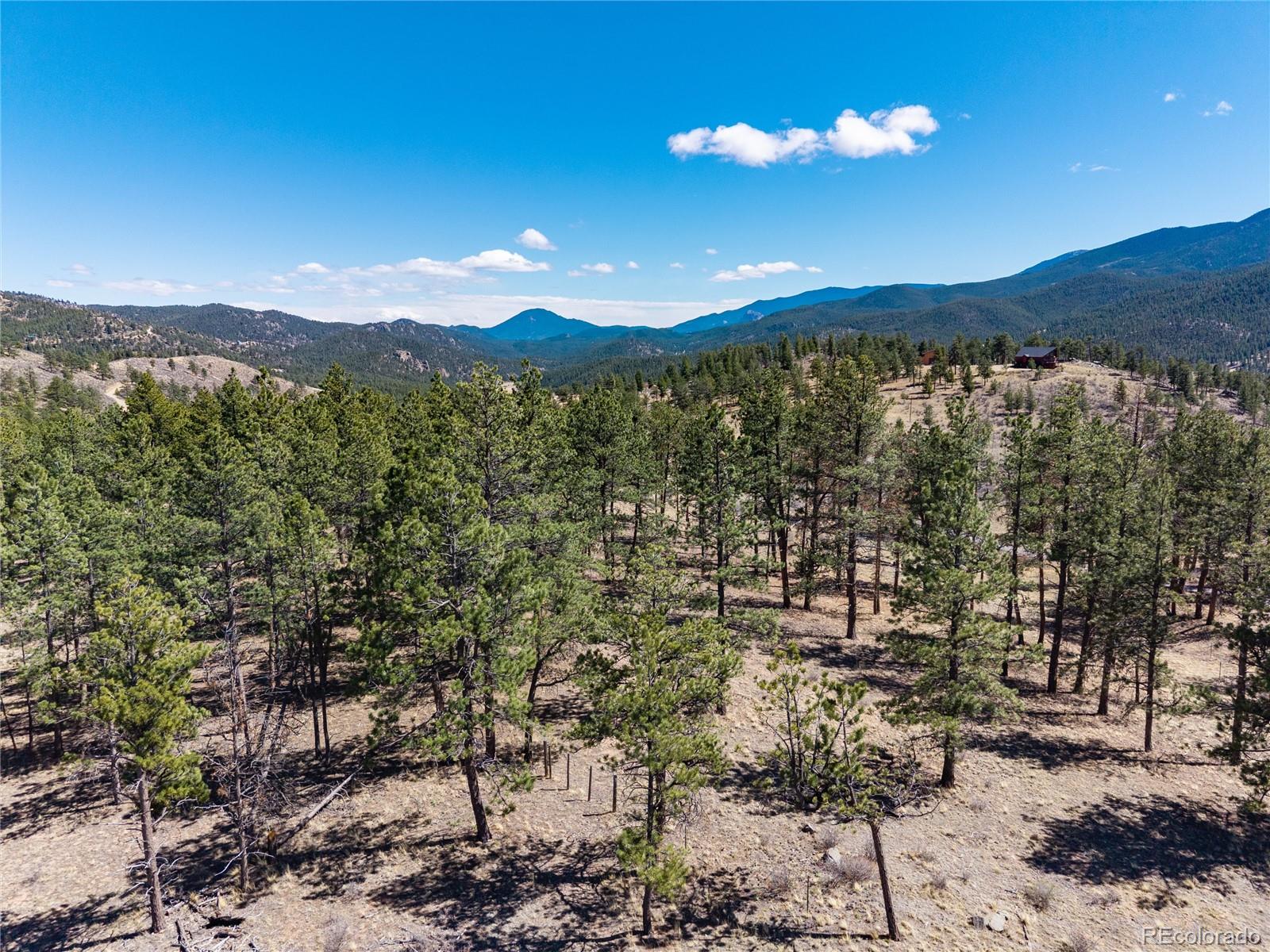 12 A Bailey Estates Bailey, CO 80421 - Photo 35 of 36 a view of a city with a mountain