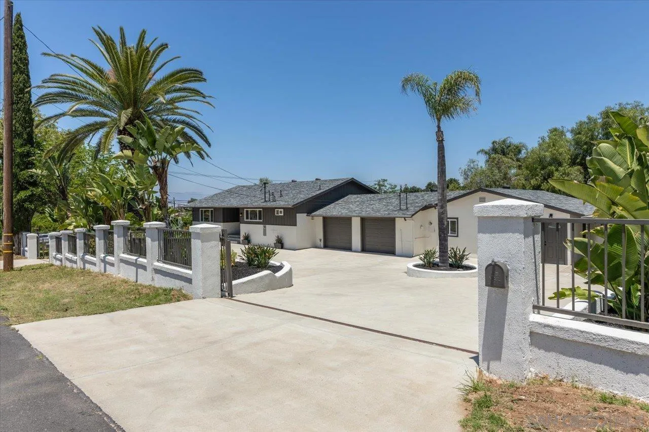 30118 Miller Road Valley Center, CA 92082 - Photo 1 of 75 a front view of a house with a yard and garage