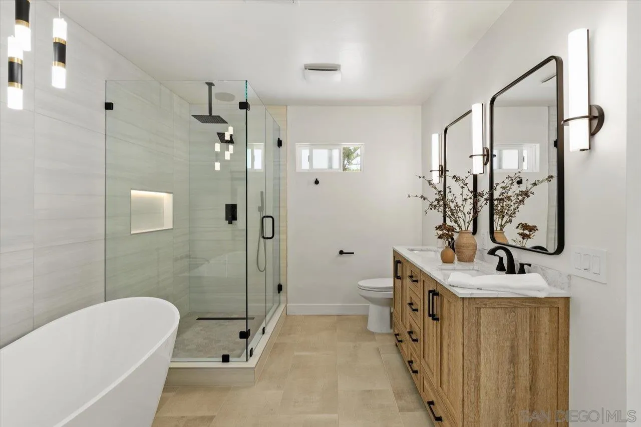 30118 Miller Road Valley Center, CA 92082 - Photo 15 of 75 a bathroom with a sink toilet and shower