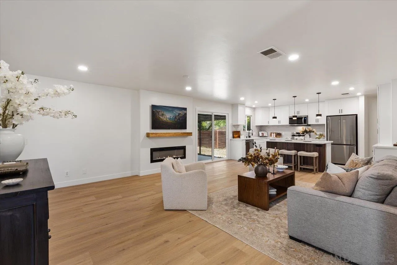 30118 Miller Road Valley Center, CA 92082 - Photo 2 of 75 a living room with furniture and a flat screen tv