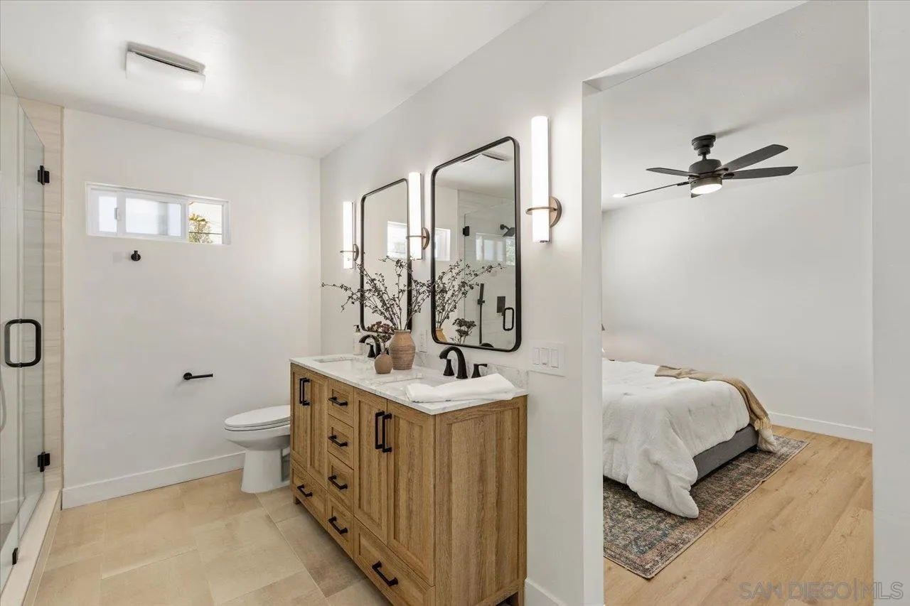 30118 Miller Road Valley Center, CA 92082 - Photo 21 of 75 a bathroom with a sink toilet and shower