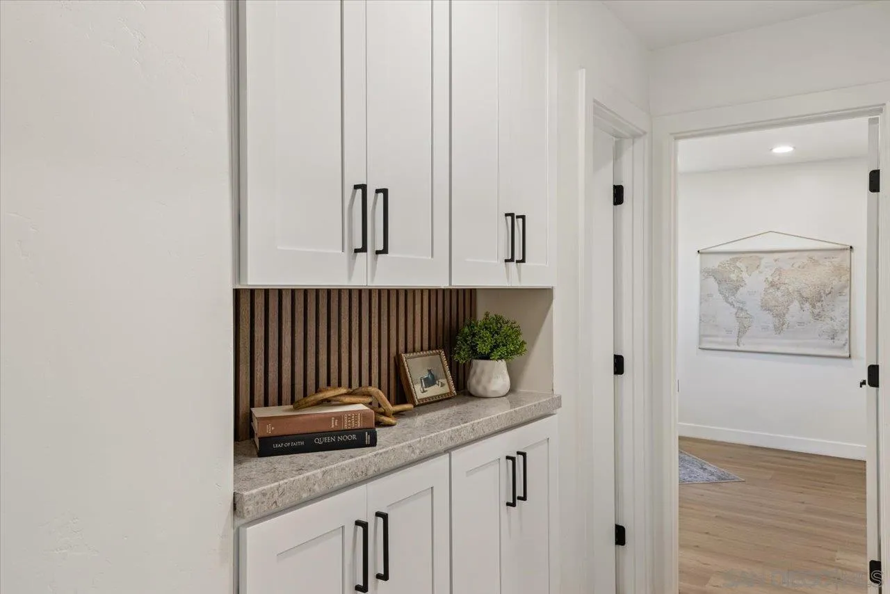 30118 Miller Road Valley Center, CA 92082 - Photo 22 of 75 a kitchen with a sink and cabinets