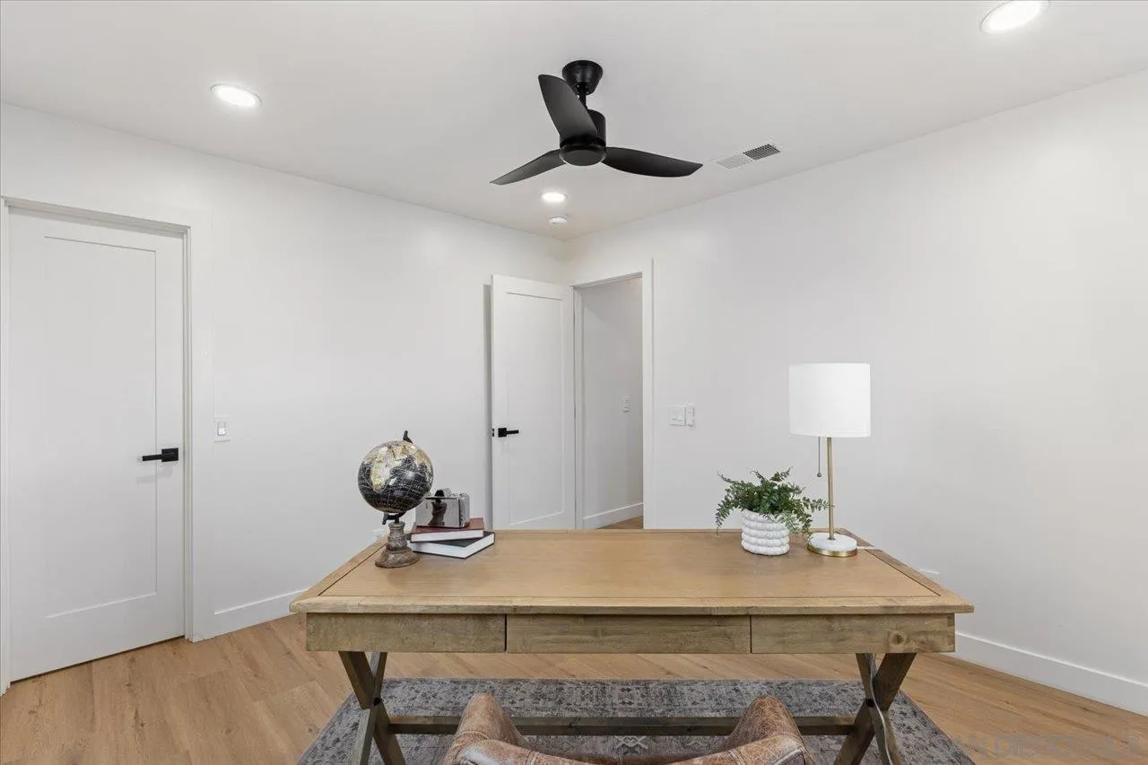 30118 Miller Road Valley Center, CA 92082 - Photo 24 of 75 a view of a dining room with furniture and wooden floor