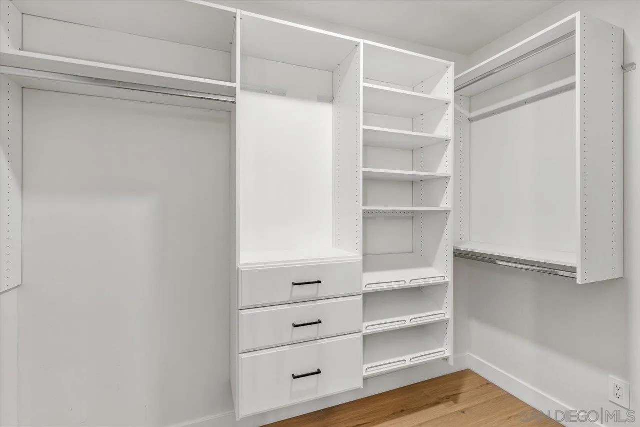 30118 Miller Road Valley Center, CA 92082 - Photo 26 of 75 a view of walk in closet with empty racks