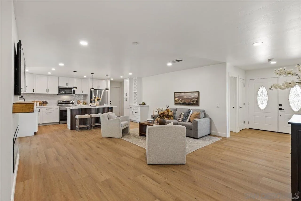 30118 Miller Road Valley Center, CA 92082 - Photo 3 of 75 a living room with furniture and kitchen view