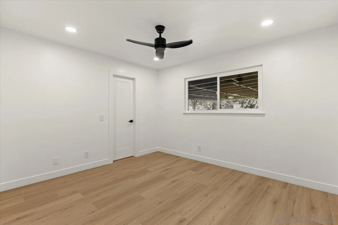 30118 Miller Road Valley Center, CA 92082 - Photo 34 of 75 a view of empty room with wooden floor