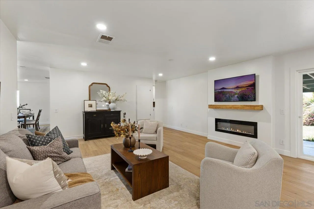 30118 Miller Road Valley Center, CA 92082 - Photo 5 of 75 a living room with furniture and a wooden floor