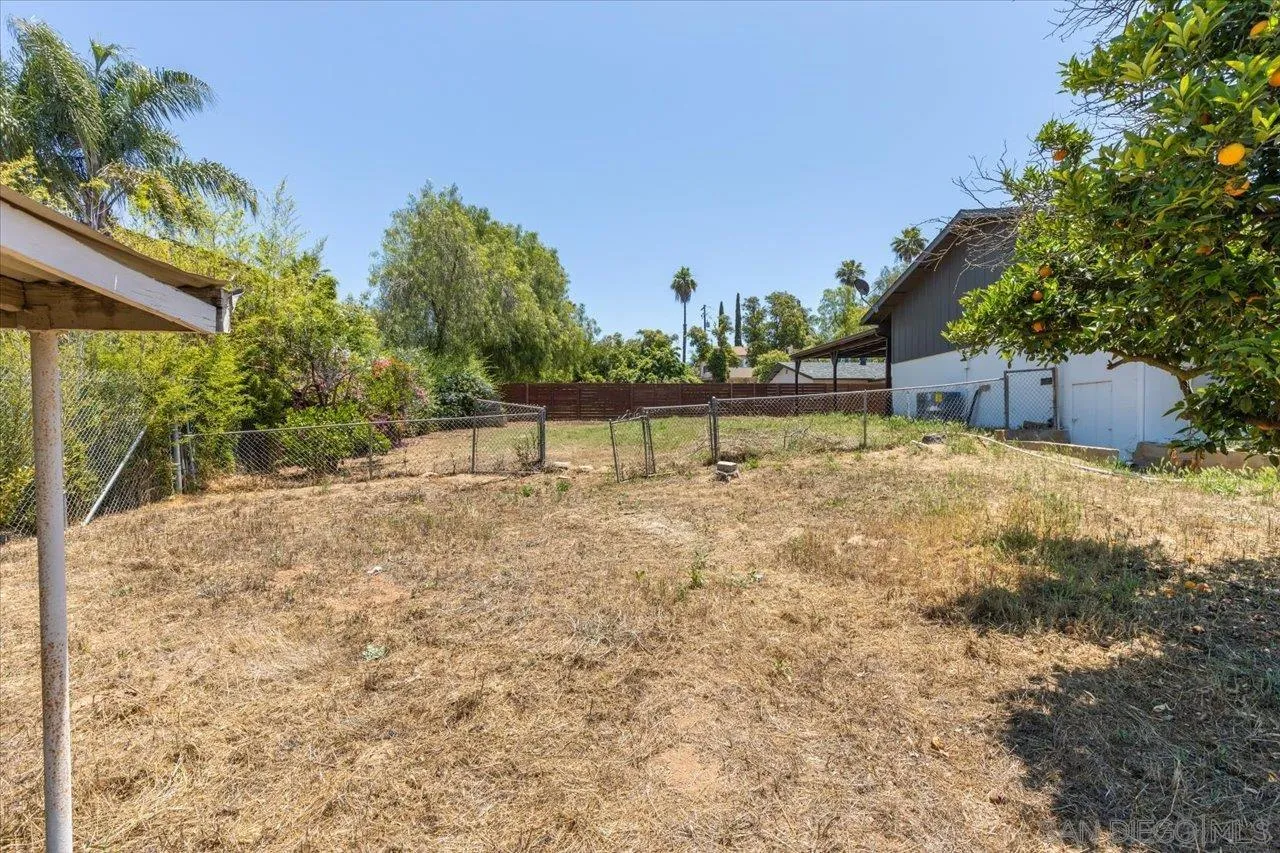 30118 Miller Road Valley Center, CA 92082 - Photo 59 of 75 a view of a bench in the backyard of a house
