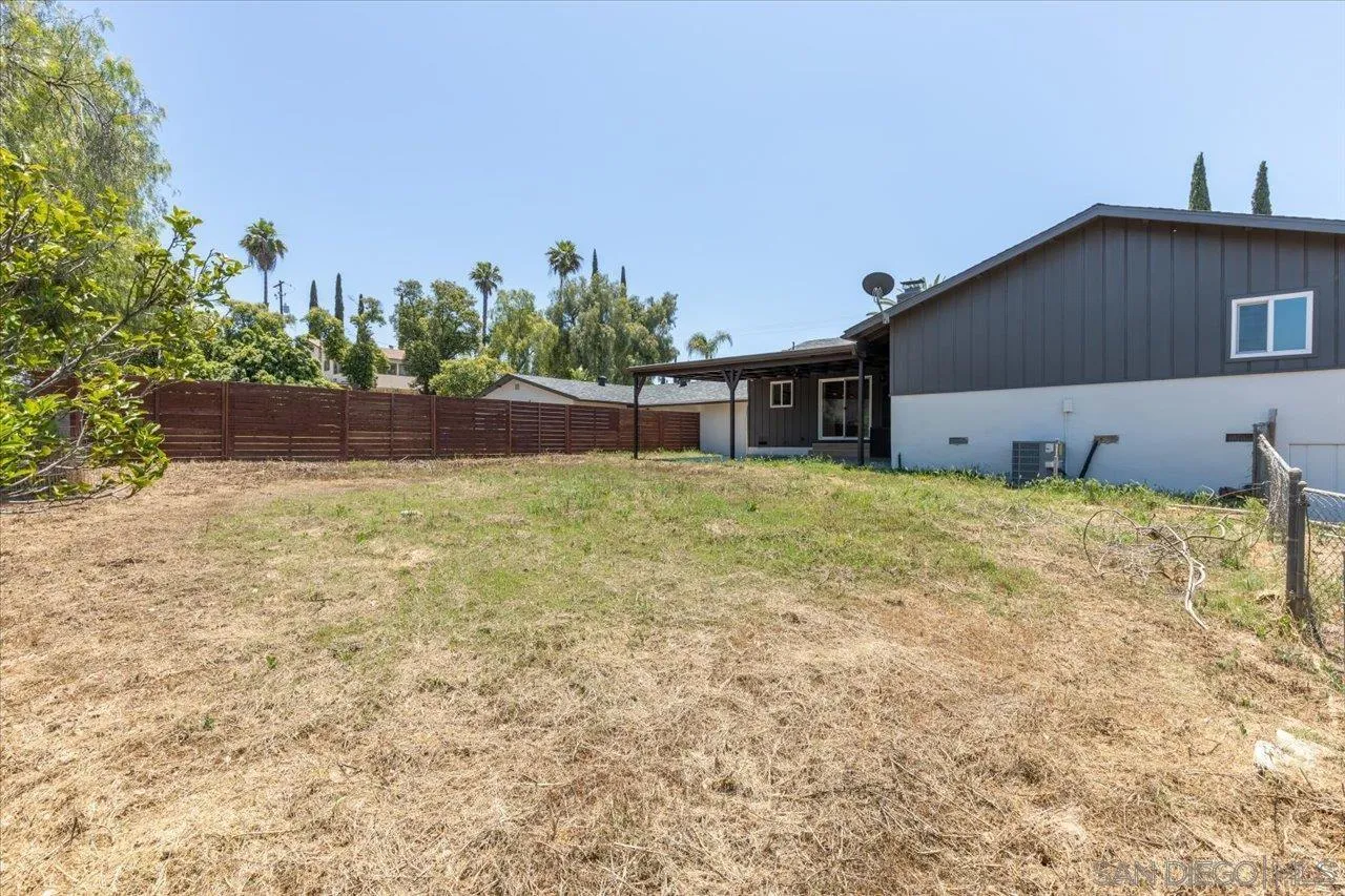 30118 Miller Road Valley Center, CA 92082 - Photo 61 of 75 a view of a house with a yard