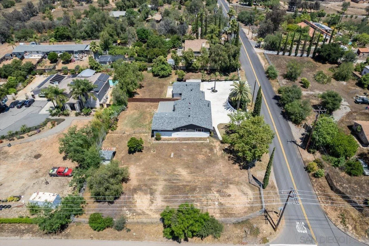 30118 Miller Road Valley Center, CA 92082 - Photo 73 of 75 an aerial view of a house with a yard and a large tree