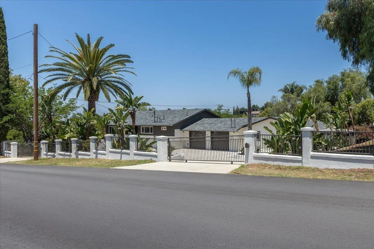 30118 Miller Road Valley Center, CA 92082 - Photo 74 of 75 a view of a house with a swimming pool and a chair