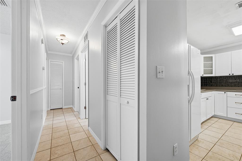 6878 Southwest 36th Street Lake Butler, FL 32054 - Photo 17 of 30 a view of a hallway to a bedroom and a bathroom