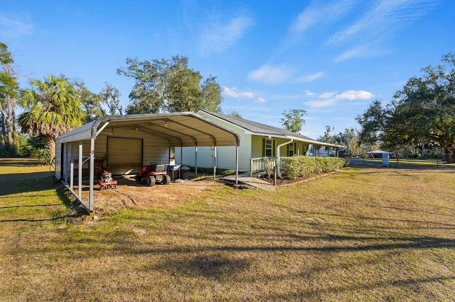 6878 Southwest 36th Street Lake Butler, FL 32054 - Photo 3 of 30 a view of a house with snow on the roof