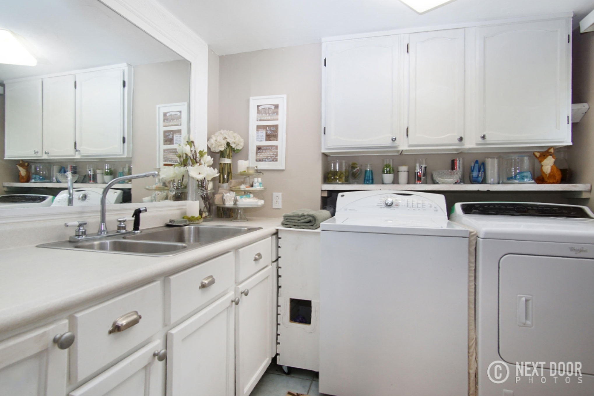 6410 Middle Lake Road Twin Lake, MI 49457 - Photo 53 of 99 main floor laundry