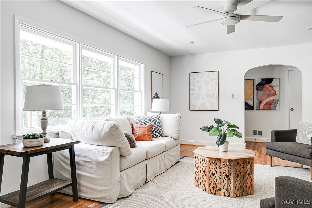 7654 Cherokee Road Richmond, VA 23225 - Photo 7 of 35 a living room with furniture and a large window