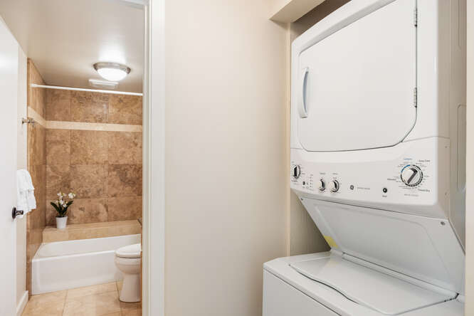 1901 Poipu Road, Unit 311 Koloa, HI 96756 - Photo 18 of 29 a bathroom with a toilet and a shower