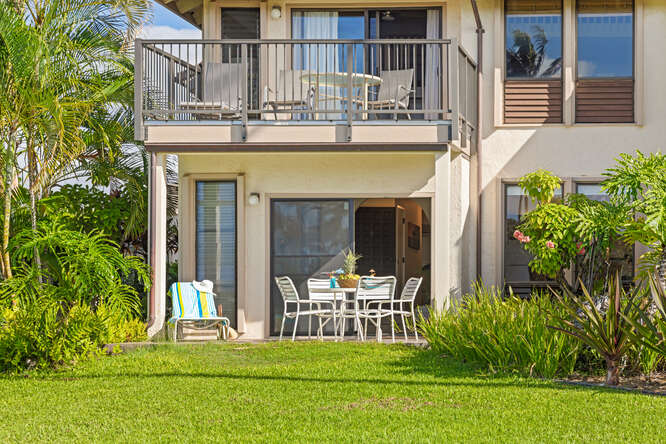 1901 Poipu Road, Unit 311 Koloa, HI 96756 - Photo 28 of 29 a front view of a house with a yard table and chairs