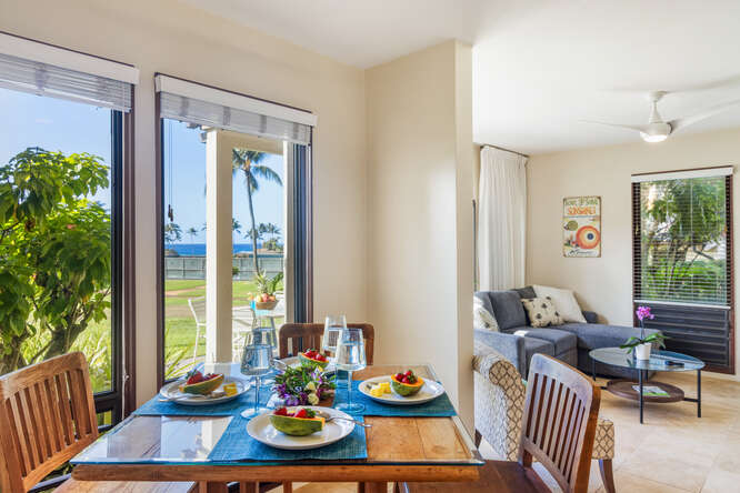 1901 Poipu Road, Unit 311 Koloa, HI 96756 - Photo 3 of 29 a living room with furniture and a potted plant