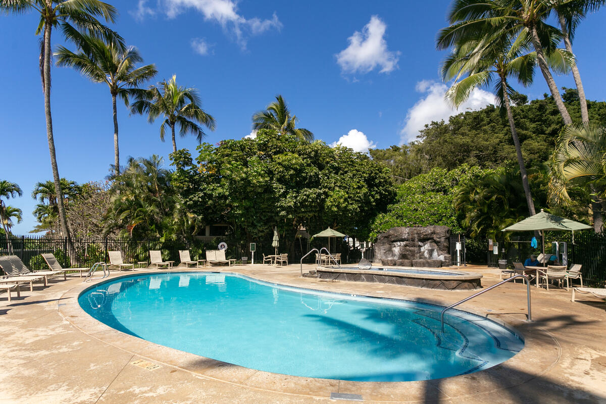 1901 Poipu Road, Unit 311 Koloa, HI 96756 - Photo 7 of 29 a view of a swimming pool with a bench