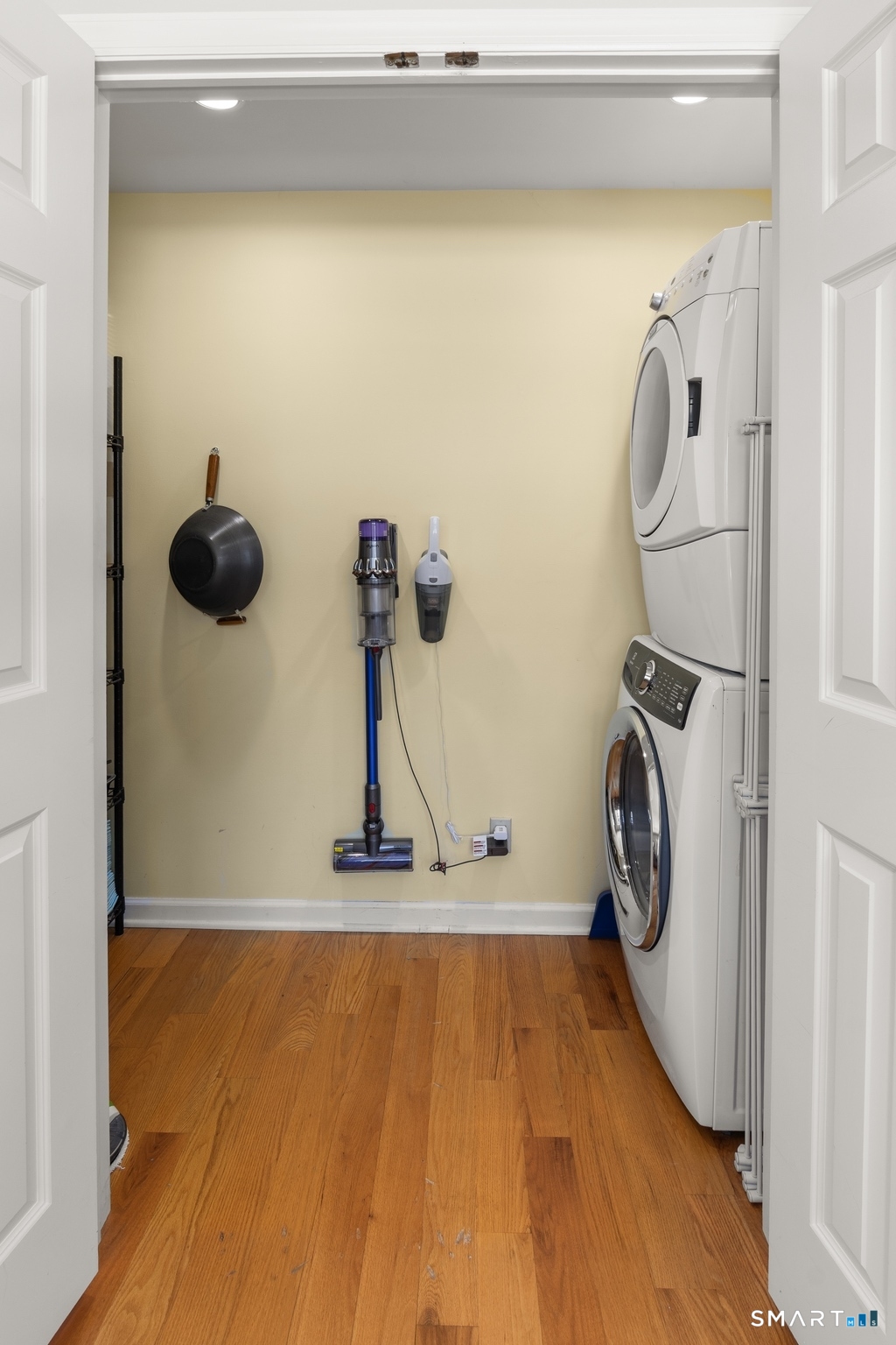 49 Minivale Road Stamford, CT 06907 - Photo 17 of 30 Cleverly located off the Dining Area, the full size stack washer/dryer is perfect. Generous storage space as well.