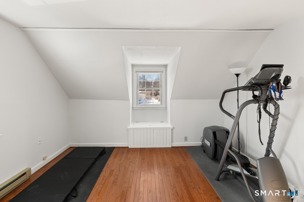 49 Minivale Road Stamford, CT 06907 - Photo 21 of 30 Upstairs bedroom to the right. Hardwood floors. Built-in bench seat.