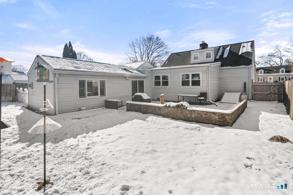 49 Minivale Road Stamford, CT 06907 - Photo 27 of 30 Patio with brick kneel wall. Perfect for summer BBQs!